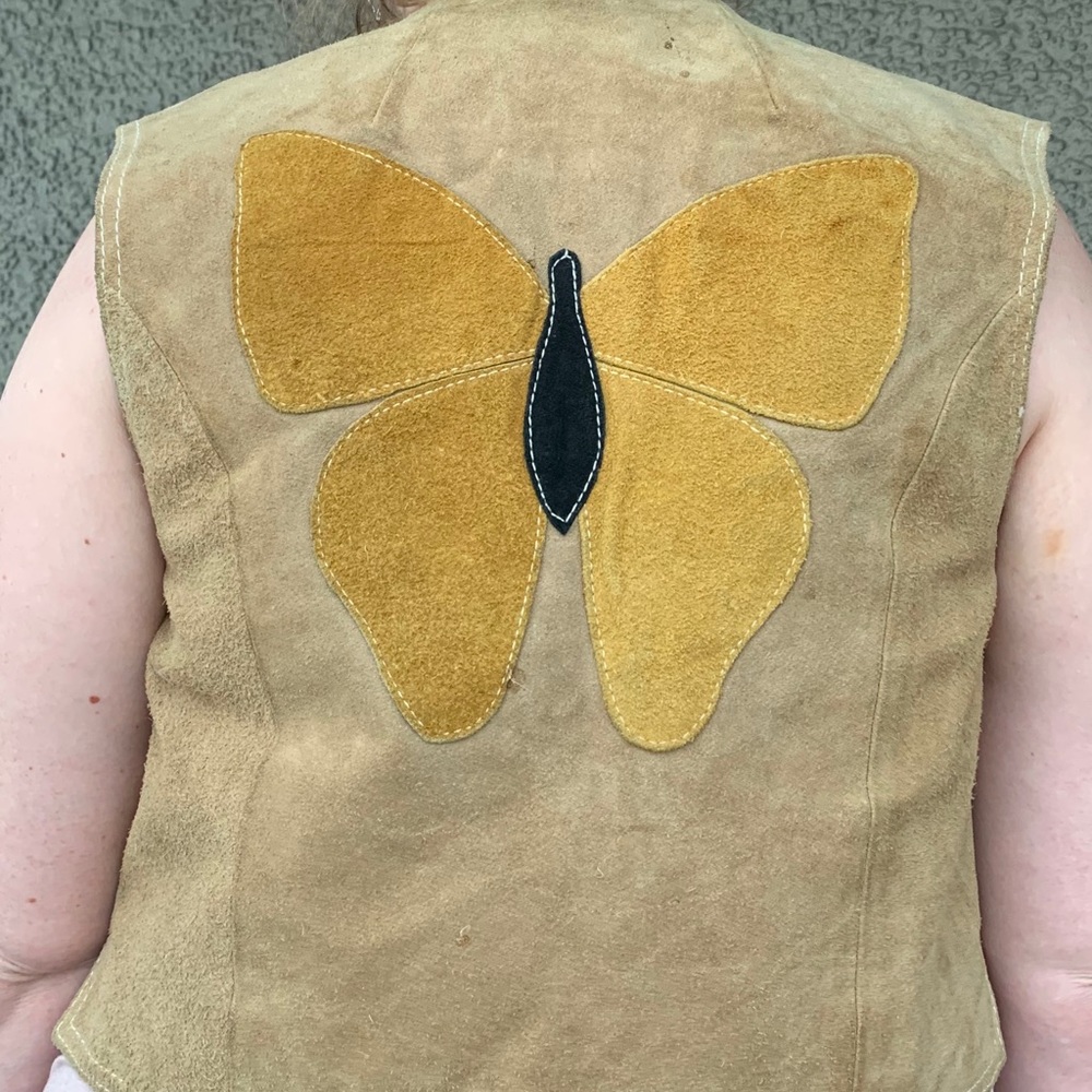 Groovy suede vest with butterfly appliqué